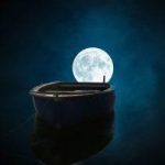 Imatge d'una barca amb la lluna al fons a la nit, per l'entrada La barca i la mar acords